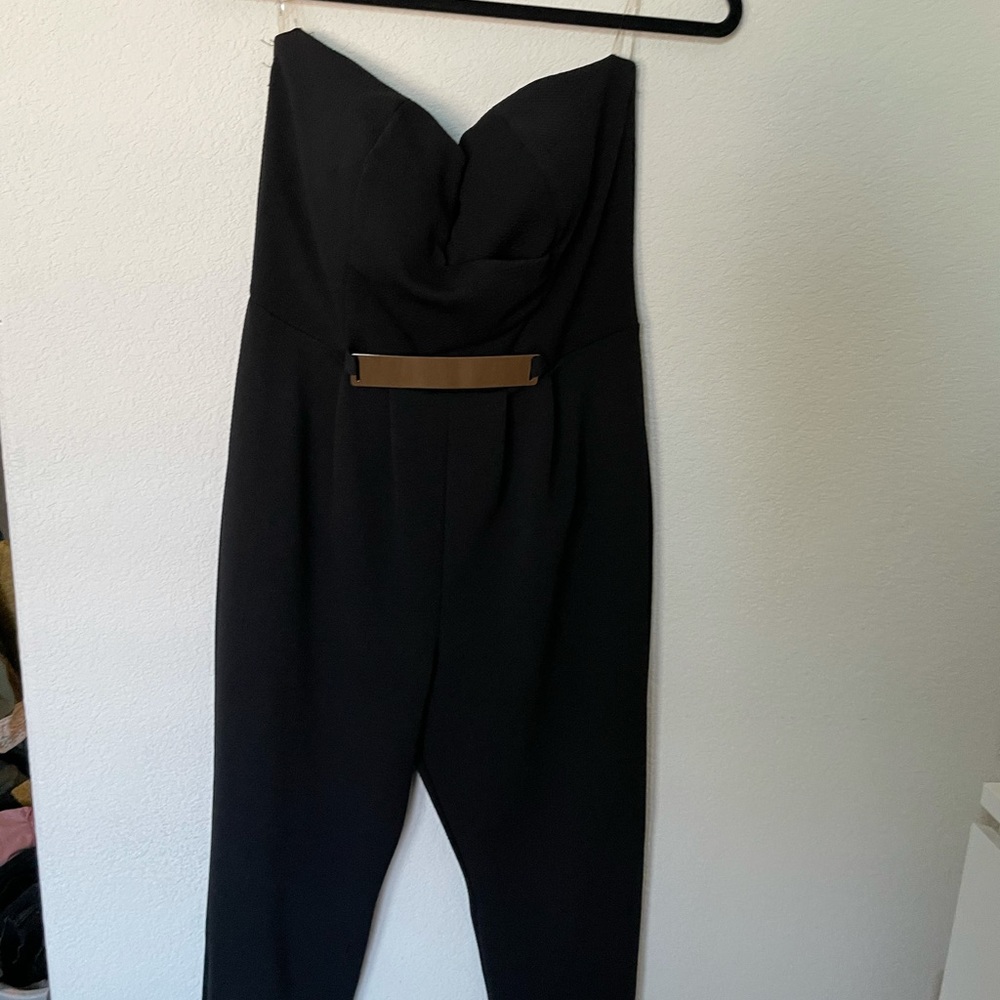 Black sleeveless jumpsuit
